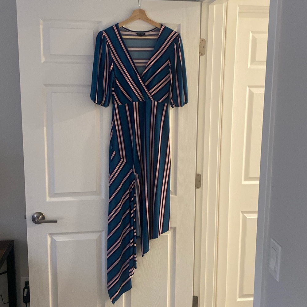 Women’s top shop US 4 asymmetric dress. Stretchy material. Used good condition